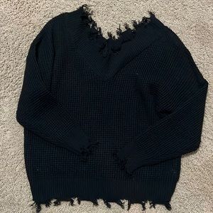 Distressed boutique over sized sweater